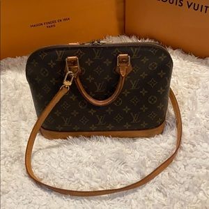 Authentic Louis Vuitton Alma bag & leather strap.